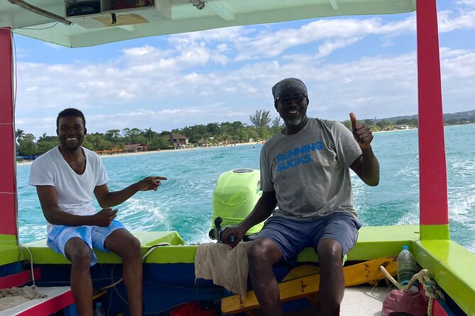 7 Miles Beach in Negril: Snorkeling, Boat Ride and Rick’s Cafe - Margaritaville for shopping, then Rick’s Cafe for sunset