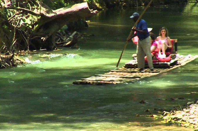 Authentic Jamaican Bamboo Rafting Tour from Montego Bay - The rapids and teamwork moments, with a captain steering