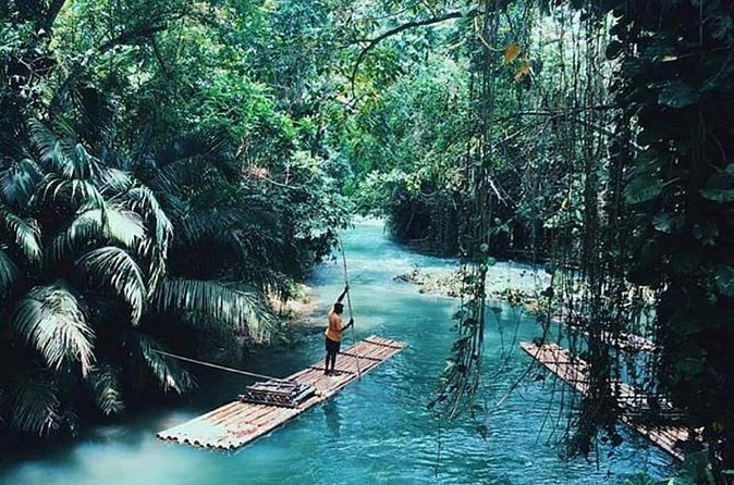 Authentic Jamaican Bamboo Rafting Tour from Montego Bay - Calm water stops for swims and relaxing on shore