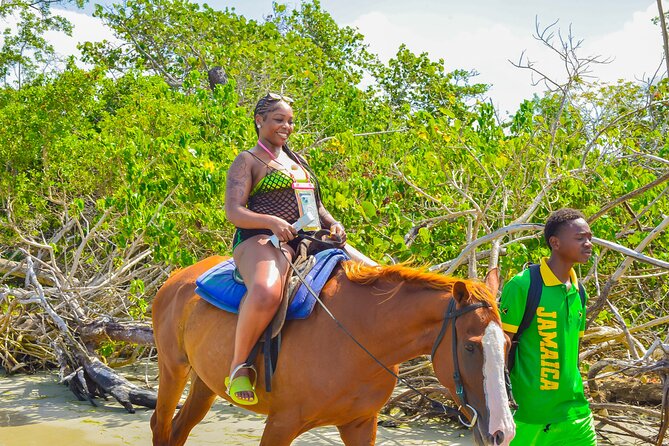 Bamboo Rafting and Horseback Riding Tour Montego Bay Jamaica - Bamboo Rafting Time on Jamaica’s River, Plus the Limestone Massage