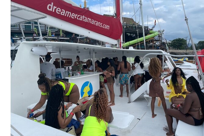 Bamboo Rafting, Catamaran Party Cruise and Snorkeling in Jamaica - Guides and drivers: friendly, musical, and easy to feel comfortable with