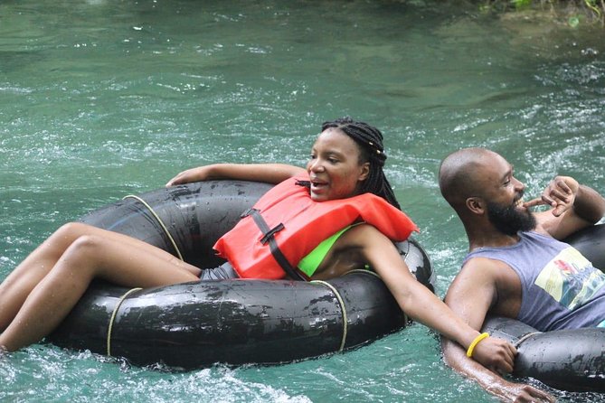 Blue Hole Adventurous and Relaxing River Tubing water Activities in Ocho Rios - The Blue Hole stop: waterfalls, jumps, cave exploring, and the rope swing