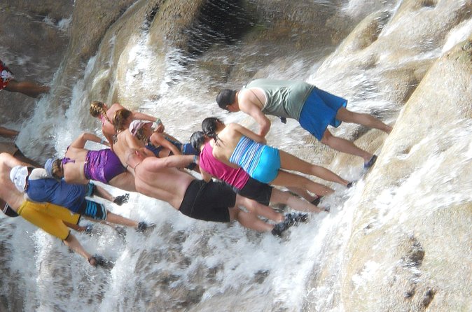 Blue Hole and Dunn's River Falls from Montego Bay - The 45-minute Scotchies stop for jerk chicken and local pork