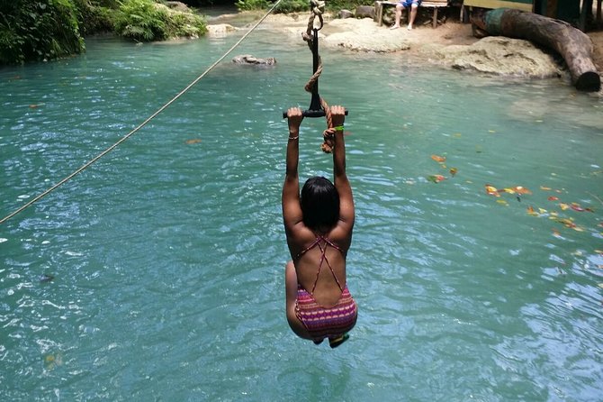 Blue Hole and Dunn's River Falls Tour from Montego Bay - Stop 2: Dunn’s River Falls climb over 180 feet, plus white sand at the base