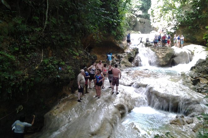Blue Hole and River Tubing from Montego Bay - Lunch and Souvenirs: The Craft Market Stop and Jerk Lunch