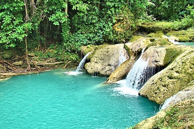 Blue Hole & Konoko Falls Park Combo Tour from Montego Bay - Blue Hole: swim time, caves, and cliff-jump options