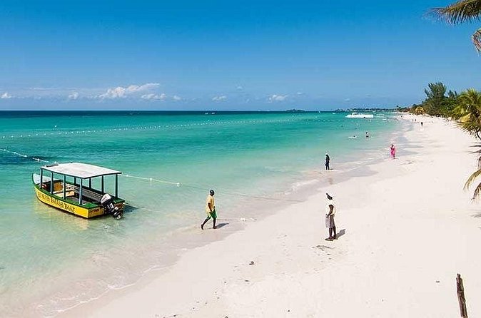 Blue Hole Mineral Spring, Ricks Cafe, 7 Mile Beach and Shopping Private Tour - Time Square Shopping Mall: a secure, easy shopping hour