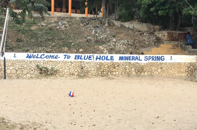 Blue Hole Mineral Springs, Rick's Café, and Shopping Combo Tour - Blue Hole Mineral Springs: 22 ft excitement, but you control your level