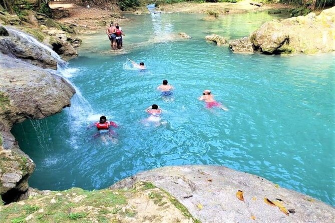 Blue Hole & Secret Falls Day-Trip with Shopping from Grand Palladium - Hotel pickup to Ocho Rios: the bus ride that actually helps