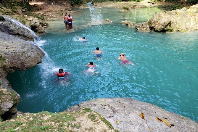 Blue Hole & Secret Falls Day-Trip with Shopping from Grand Palladium - Secret Falls: the short walk, the hug-of-water feeling, and photos