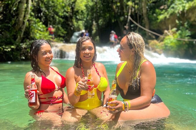 Blue Hole Secret Falls, White River Rafting, and River Tubing from Ocho Rios - Calypso-style inner-tube tubing on the White River: when it turns fun and physical