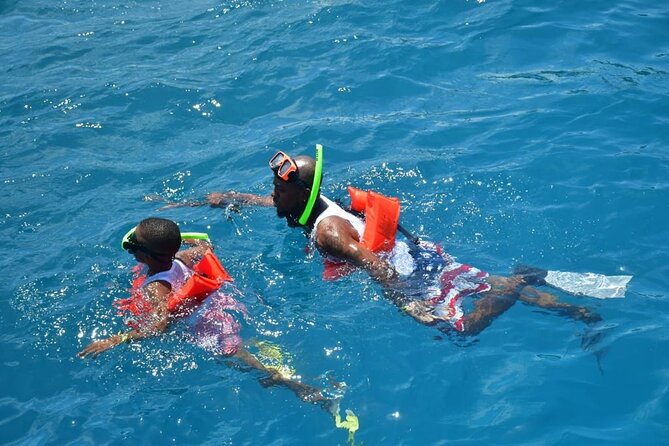 Boatride & Snorkeling then Margaritaville Hipstrip Activity - Private resort pickup, in air-conditioned comfort (and a driver who sets the tone)