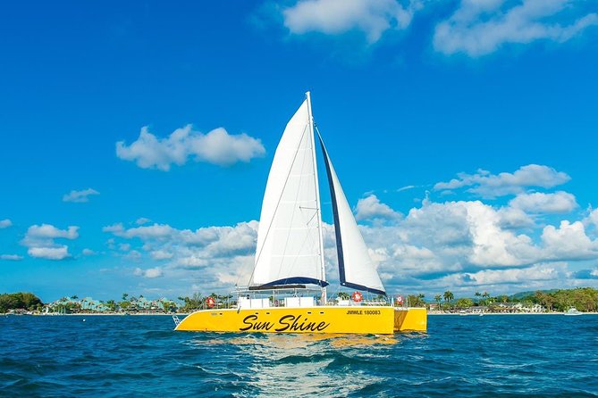Catamaran Cruise Full Day Tour to Reef, Caves and Negril Beach - Snorkeling From the Boat: Coral, Fish, and Included Gear