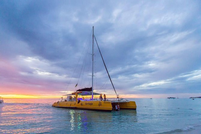Catamaran Cruise Full Day Tour to Reef, Caves and Negril Beach - Onboard Vibe: Open Bar, Reggae, and the Crew Personality