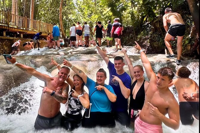 Combo Tour Dunn's River Falls and BlueTour from falmouth - Blue Hole: swimming plus adventure options like rope swings and a small cave