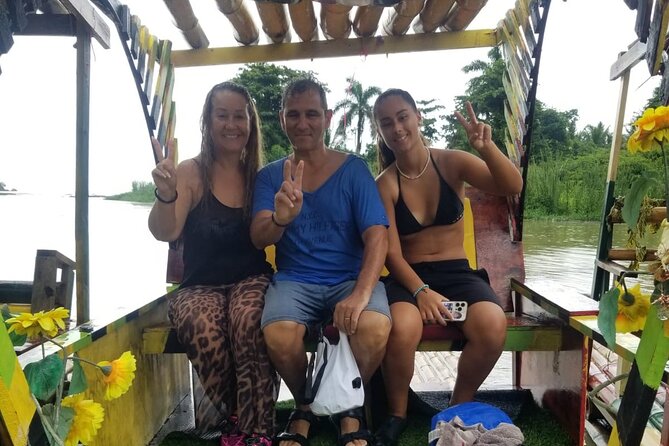 Customized Bamboo Rafting Limestone Massage with Coconut Water - On the Raft: Music, Dancing, and Culture While You Float