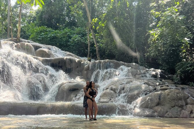 Dunn's River Park & Blue Hole Waterfall Combo from Montego Bay - Blue Hole sinkholes: limestone water fun with guided jumping and rope swing style moments