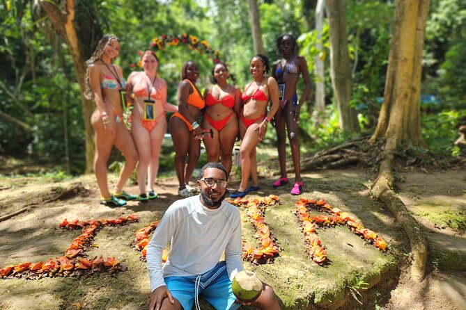 Dunns River Falls & Blue Hole Combo from Montego Bay with Pick Up - The Blue Hole water park: jumps, swings, and safety gear that helps