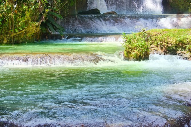 Falmouth Dunns River Falls and Blue Hole Excursion - Blue Hole: Rope Swings, Caves, and What to Budget for on Site