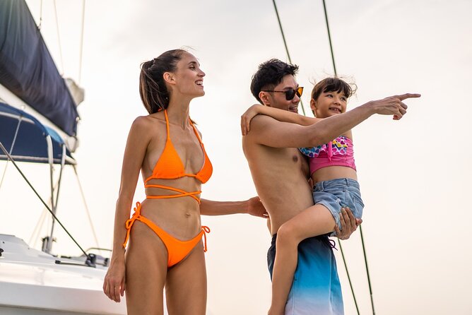 Family Catamaran Cruise from Jamwest Beach Negril Hotels - Snorkeling stop: included gear, fish spotting, and safety pace
