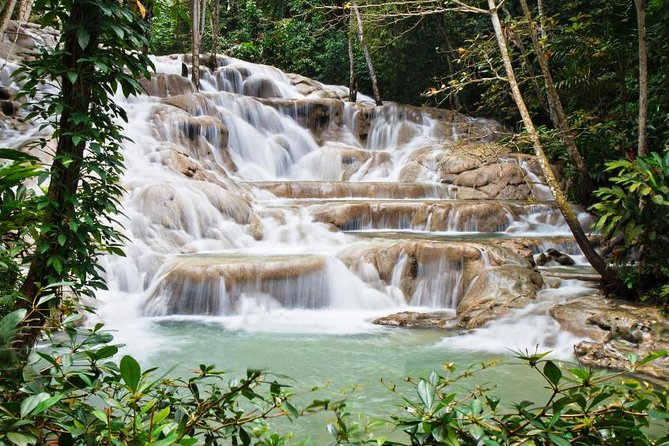 Jamaica Combo Tour: Dunn's River Falls and Bob Marley’s Nine Mile - Mystic Lagoon add-on at night: boat ride plus Joe James dinner