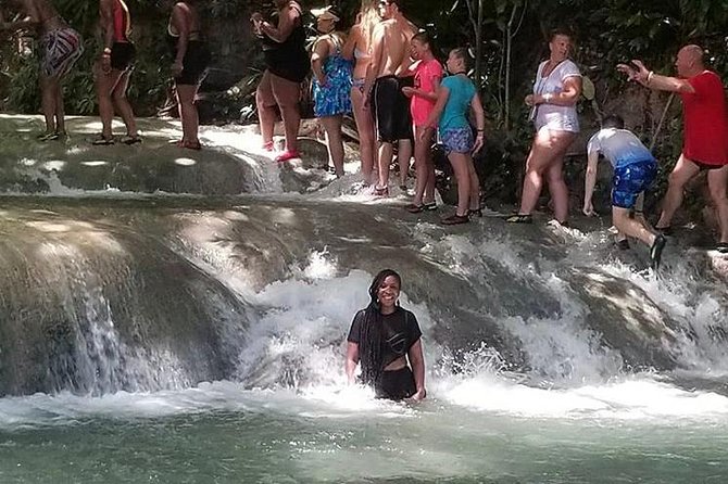 Martha Brae and Dunn’s River Falls Day Tour - Dunn’s River Falls: arm band entry, guide help, and a climb that feels real