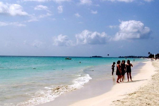 Negril Beach Beach Ricks Cafe and Sunset Tour - Margaritaville Negril Beach: Four Hours of Sand, Sun, and Built-In Amenities