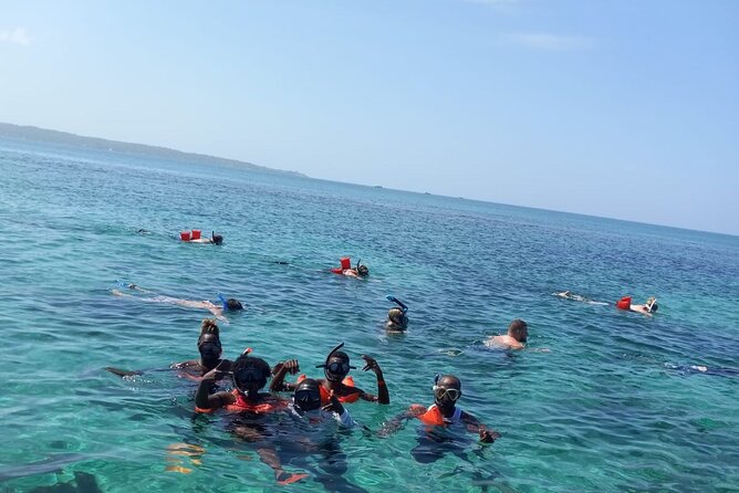 Negril Glass Bottom Boat Tour Snorkeling and Booby Cay - The boat ride out: how the glass bottom sets your expectations