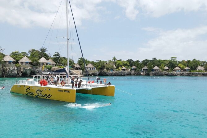 Negril PRIVATE CHARTER Catamaran (rate for 21 persons) - Private Catamaran Day in Negril, With Snorkel Stops and Rick’s Cafe