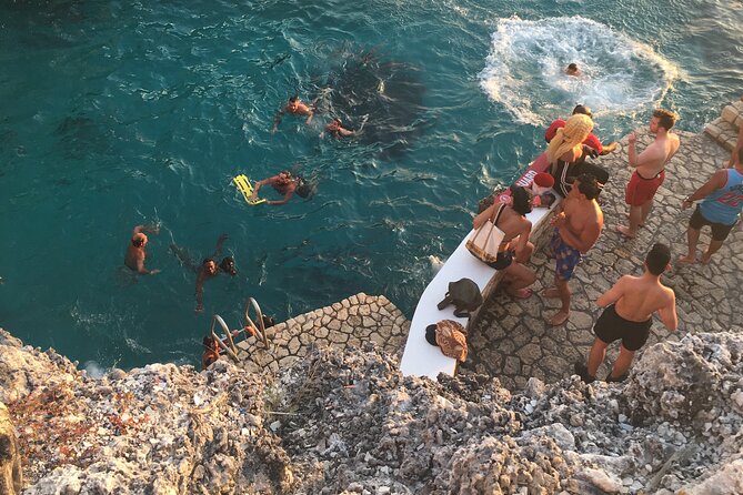 Negril Seven Miles Beach, Snorkeling, Boat Ride, Ricks Cafe Combo - Seven Mile Beach: what you do with the sand time