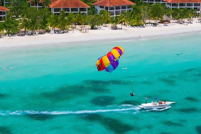 Negrils Seven Miles Beach, Rick's cafe and Parasailing Tour. - Key things that make this Negril day work