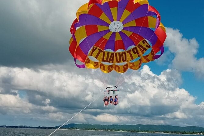 Negrils Seven Miles Beach, Rick's cafe and Parasailing Tour. - Getting there: Montego Bay pickup plus town-stop storytelling
