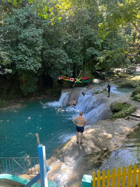 Ocho Rios : Blue Hole and Sightseeing Tour - Pickup and drop-off: the CoopaTours sign, plus cruise port details