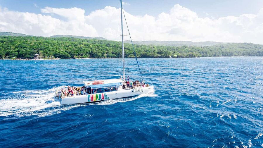 Ocho Rios: Catamaran Sail & Snorkel + Dunn's River Climb - A tight 5-hour combo in Ocho Rios: sail, snorkel, and Dunn’s River