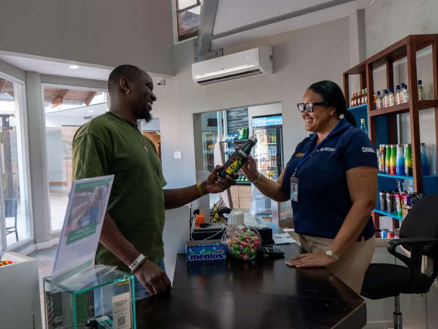 Ocho Rios: Catamaran Sail & Snorkel + Dunn's River Climb - The Island Village break: lunch, coffee, and duty-free browsing