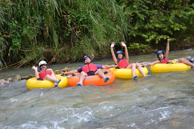 Ocho Rios: Waterfalls, River Tubing, and Beach Adventure - Raft Paddle to Bengal Bay: When the Water Becomes the Wind-Down
