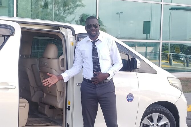 Private Transfer From Norman Manley Airport to Kingston one way - Finding Your Driver With a Sign at the Airport