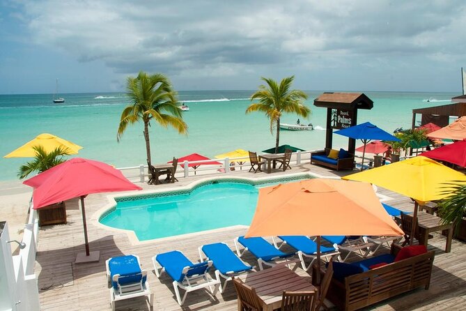 Private Transportation from Montego Bay Airport to Negril hotels - Included perks inside the vehicle (yes, Red Stripe is part of the deal)