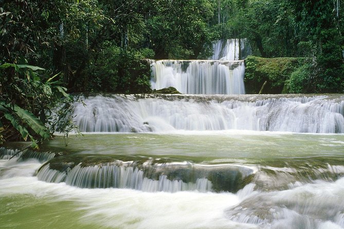 [PRIVATE] YS Falls from Negril - Entrance fees + Lunch Included - The tractor-pulled jitney ride and the 2,000-acre estate feel