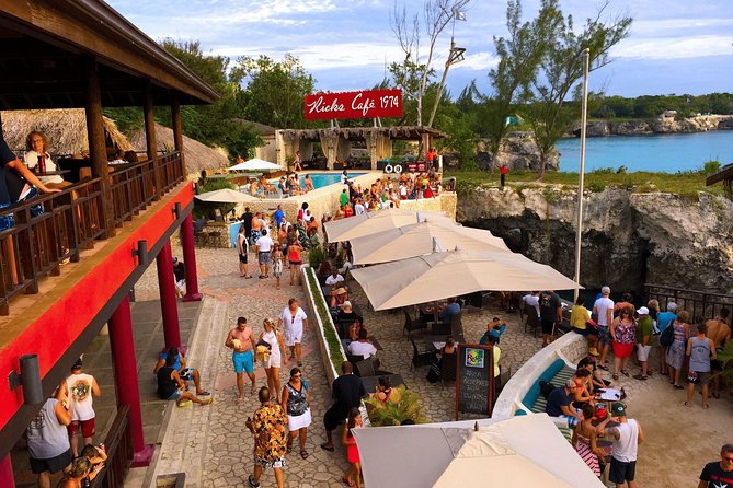 Rick's Café and Seven Mile Beach Private Tour - Stop 1: Seven Mile Beach for Snorkel, Paddle, and Easy Swimming