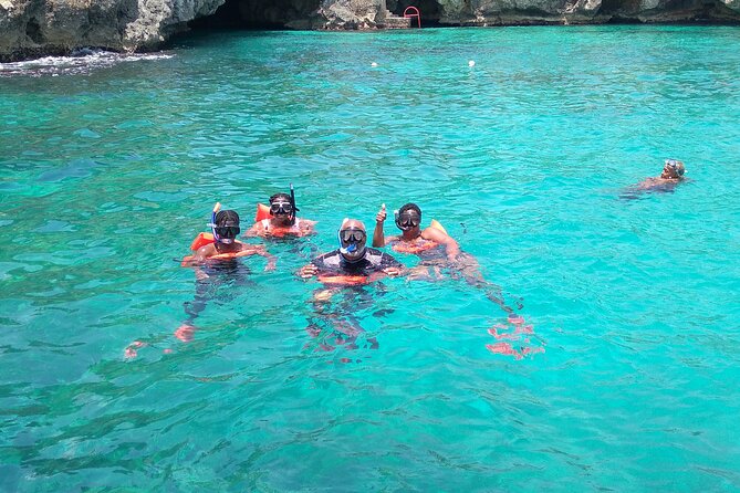 Rick's Cafe Sunset Cruise - Negril in three acts: caves, reef, then Rick’s Cafe sunset