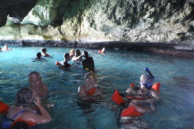 Rick's Cafe Sunset Cruise and Snorkelling - Negril Caves Stop: Pirates, Still Water, and a Change of Pace