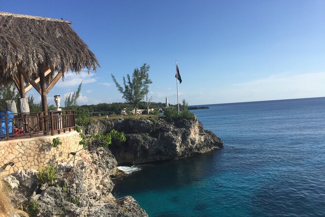 Ricks Cafe Party Cruise with Open Bar & DJ MONTEGO BAY RESORTS - Rick’s Cafe finish: watching cliff-jump action with a sunset option