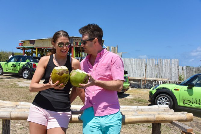 Self-Driven MINI Cooper Tour From Montego Bay To Negril - Coconut vendor and jerk shack: the local stops that make the drive feel real