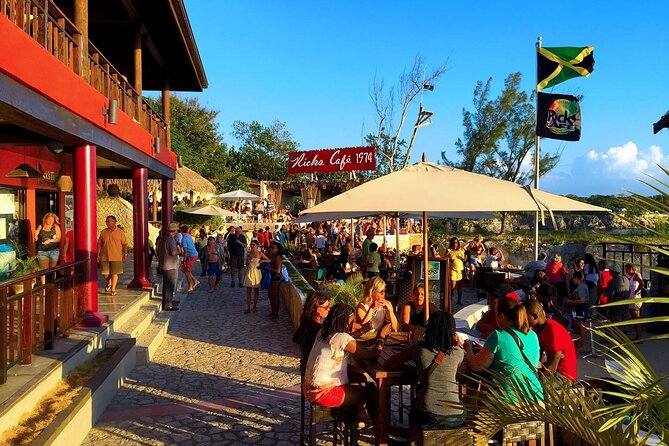 SUNSET PARTY CRUISE Rick's Cafe Ocean Coral / Eden Bay Guests - Seven Mile Beach at Margaritaville Negril: golden sands with a time limit